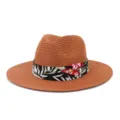 Nahaufnahme des braunen Stroh Hutes mit Blumenband, ideal für sommerlichen Strand Sonnenschutz. - 58cm / Karamellbraun