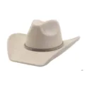 Close-up detail of the beige soft suede cowboy hat featuring a sparkling rhinestone band. - Beige