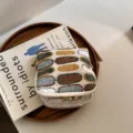 Geborduurd linnen sieraden opbergtasje, mini rits etui voor ringen en kleine accessoires. - Vierkante opbergtas / Ovaal Borduurwerk Broken Wit