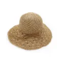 Detailed view of the handmade crochet straw hat, showing hollow weave and brown bow decoration. - Khaki