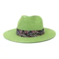 Green straw fedora hat detail, elegant paisley print band, perfect for summer sun protection. - Green