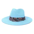 Light blue woven straw fedora sun hat detailed with a classic black paisley ribbon band. - Lake Blue
