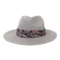 Detailed view of the stylish summer straw fedora hat with colorful paisley band for outdoor sun. - Gray