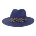 Blue fedora straw hat detail view showing the colorful paisley ribbon band and fine woven texture. - Navy Blue