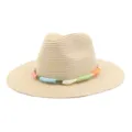 Detailed view of summer straw fedora hat, classic wide brim with colorful braided band. - Beige