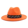 Orange wool fedora hat with ethnic style embroidered band, detailed view of flat brim jazz hat. - 58cm / Orange