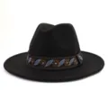 Detailed view of black wool fedora hat with ethnic embroidered band, flat brim style. - 58cm / Black
