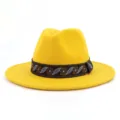Close-up view of the bright yellow felt fedora hat featuring an ethnic-style decorative band. - 58cm / Yellow