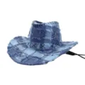 Detail view of the distressed blue denim patchwork cowboy hat showing raw frayed edges and stitching. - One Size 57-58cm / Blue