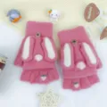 Close-up detail of cute pink knitted fingerless gloves with white rabbit ears and soft texture. - One Size / Watermelon red