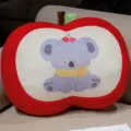 Cute red apple plush pillow with cartoon animal print, soft sofa cushion for home and office. - Koala