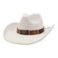 Detail view of a white suede cowboy hat featuring a brown leather band and metal bull skull. - Cream
