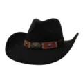 Detailed closeup view of the exquisite metal bull skull emblem on the stitched leather hatband. - Black