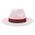Detailed view of pink wool felt jazz fedora hat featuring classic red and green stripe band. - 58cm / Pink