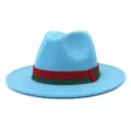 Detail shot of the blue wool fedora hat featuring a classic red and green striped ribbon band. - 58cm / Lake Blue