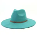 Detail view of the turquoise faux suede wide brim fedora hat with brown braided belt strap. - M (56-58cm) / Teal