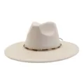 Close-up of off-white suede fedora hat with gold chain band and wide flat brim. - 58cm / Beige