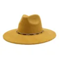 Close-up detail of the yellow suede fedora hat featuring a stylish black and gold chain band. - 58cm / Turmeric