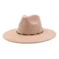 Close-up detail of a beige suede fedora hat with a stylish black and gold chain band. - 58cm / Champagne