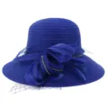 Detailed view of the elegant blue organza sun hat with mesh bow and sparkling rhinestone chain. - 58cm / Sapphire Blue
