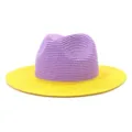 Detail of stylish color-blocked straw fedora hat featuring purple crown and vibrant yellow brim. - Adjustable / Color 10