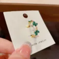 Open ring with green zircon four leaf clover design, stylish gold plated fashion jewelry ring. - No. 29 Green Four-Leaf Flower Open Ring (Thick Real Gold Plating)