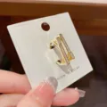 Gold-plated open ring featuring sparkling cubic zirconia stones in a modern geometric design. - 43# Gold Irregular Open Rings (Thick Real Gold Plated)