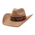 Close-up detail of western cowboy hat in soft suede with pink embroidered bull skulls. - 58cm / Camel