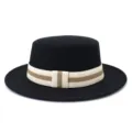 Detailed view of black wool flat top hat featuring an elegant striped elastic band. - 58cm / Black