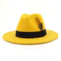 Detailed view of yellow wool fedora hat showing black ribbon and feather decoration. - 58cm / Yellow