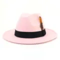 Pink wool fedora hat for women men, wide brim jazz cap with black band and feather decor. - 58cm / Pink