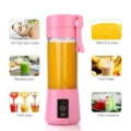 Tragbarer elektrischer Entsafter Becher, rosa persönlicher Smoothie Maker Mixer Frucht. - Rosa