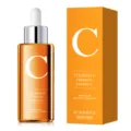 Detailed view of the Vitamin C firming facial essence bottle and matching bright orange box. - Vitamin C Firming Essence 30ml/Box / Orange
