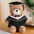 Afstuderen teddybeer pluche speelgoed met afstudeerhoed en jurk zachte pop cadeau studenten. - Roze V-hals + zwarte kleding