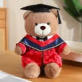 Afstudeer teddybeer pluche speelgoed met rode toga, zacht studentengeschenk voor examenfeest. - Rode V-hals + Rode kleding