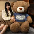 Giant plush teddy bear with a cute blue sweater featuring a heart design for cozy hugging. - 80cm / Brown Bear - Sweater Style