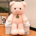 Cute pink pig plush toy doll, soft stuffed animal figure with cute pendant ornament. - Pig