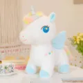 Cute plush unicorn toy with colorful rainbow mane and soft blue wings for kids and girls. - 35cm / Blue