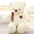 Large white teddy bear plush toy featuring brown ribbon and love heart patch for cute gift - White Heart Bear