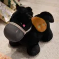 Cute black pony plush toy with saddle and colorful halter, perfect companion gift for kids. - 23cm / Black