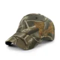 Vue détaillée d'une casquette de baseball tactique camouflage avec motif feuillage et œillets. - Réglable / Camouflage feuilles mortes Real Tree