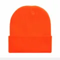 Close-up of vibrant orange cuffed knitted beanie detail, showing soft winter warm texture. - Orange Red