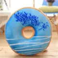 Detailed view of the cute blue donut plush pillow, soft texture with colorful sprinkles. - Blue Lover