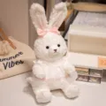 Lindo juguete de peluche de conejo con lazo rosa y vestido blanco animal de peluche suave - Conejito 33 cm / Ver detalles