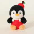 Cute penguin plush toy with apple hat and red overalls, soft stuffed doll decoration. - Apple Penguin