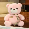 Pink sitting teddy bear plush toy with flower vine decoration, cute doll gift for girls. - Pink Bear with Cotton Flower