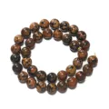 Vue detaillee de fil de perles rondes en obsidienne pavot polie pour creation de bijoux. - 6.5mm (Environ 62 Pcs/Fil) / Orange