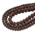 Natural brown lava rock loose beads close up, porous volcanic stone round beads detail view. - 6.5mm (Approx 60 Pieces Per Strand) / Coffee