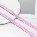 Nastro con frange di ponpon rosa in poliestere per cucito di vestiti per bambole DIY e decoro. - Confezione da 2 Metri / Rosa chiaro