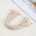 Close-up detail of white polyester hang tag strings, perfect for clothing and label attachment. - 20-Piece Pack / Off White